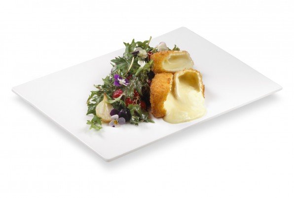Creamy Camembert melted in panko crosta, blueberry textures, glazed onion and fresh leaves.