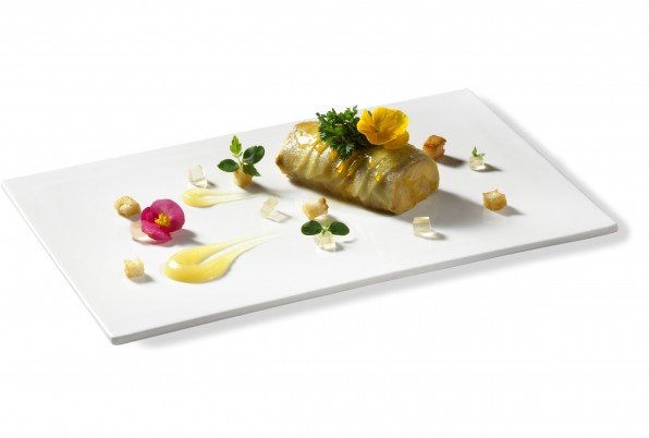 Foie mi cuit covered in thin slices of caramelized apple, geleé of late harvest and croutons of orange bread.