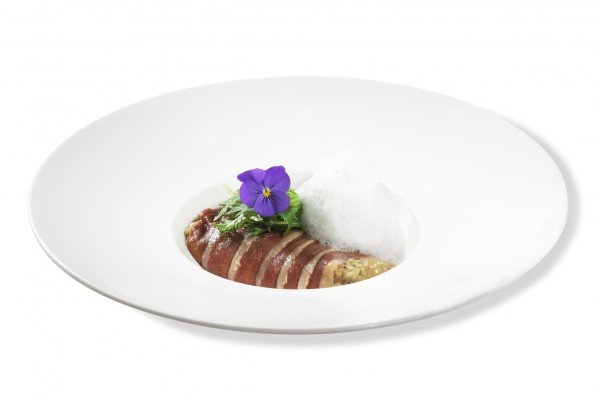 Arroz cremoso de Boletus edulis, envuelto en fino carpaccio de magret de pato del Lluçanés y nube de parmesano.